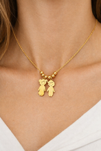 Colar Dourado com Pingentes Menino e Menina em Aço Inoxidável Romanely