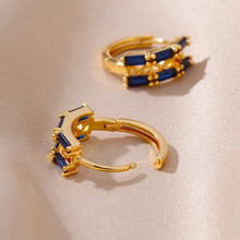 Brincos Dourados em Aço Inoxidável com Zircónias Azuis