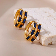 Brincos Dourados em Aço Inoxidável com Zircónias Azuis