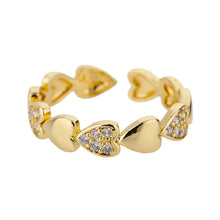 Anillo ajustable de acero inoxidable dorado con corazones y circonitas